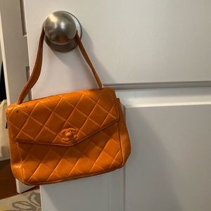 Authentic Chanel Small Orange Quilted Bag